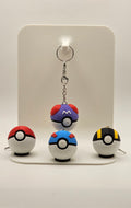 Set of four Pokéball fidget clickers