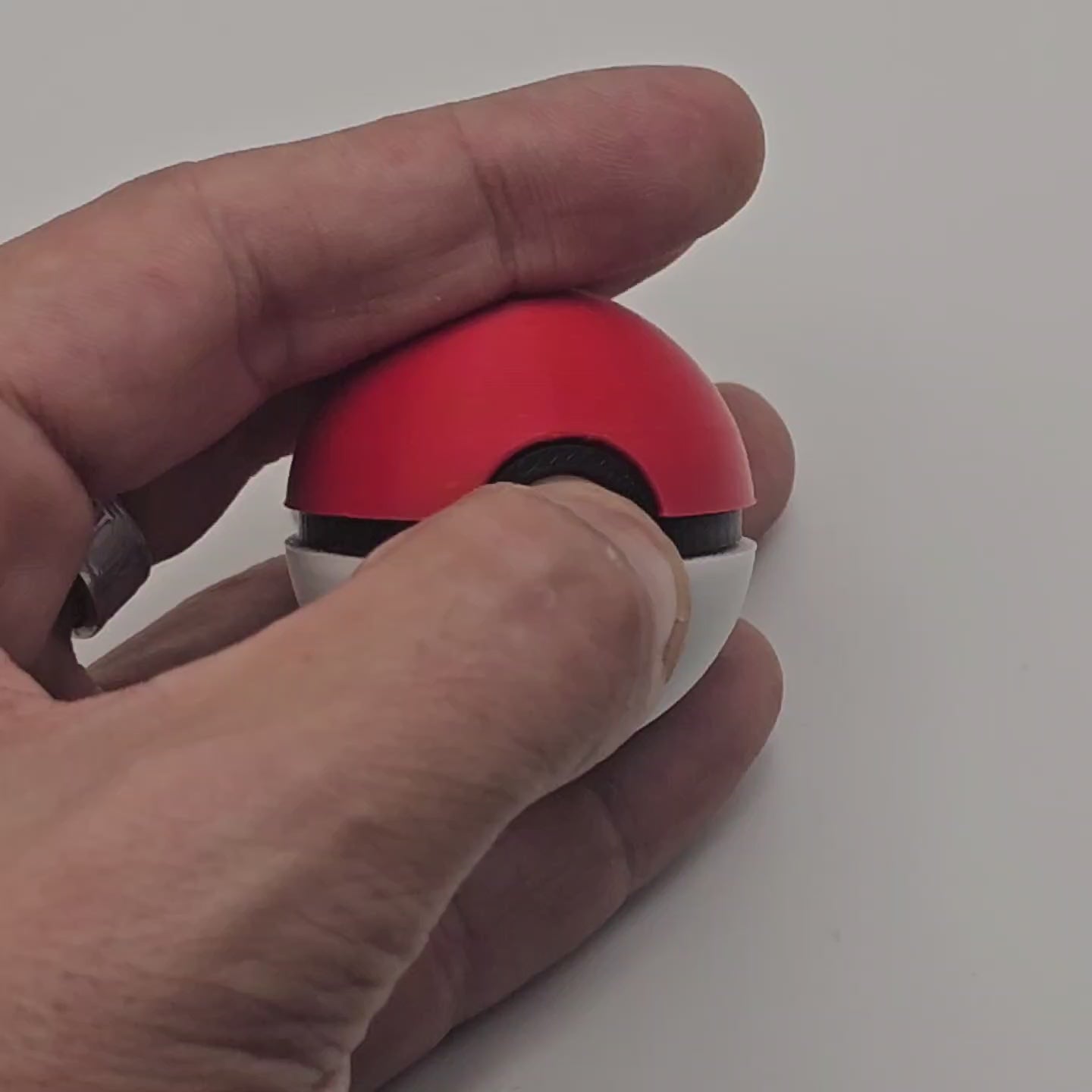 Pokéball fidget clicker being clicked